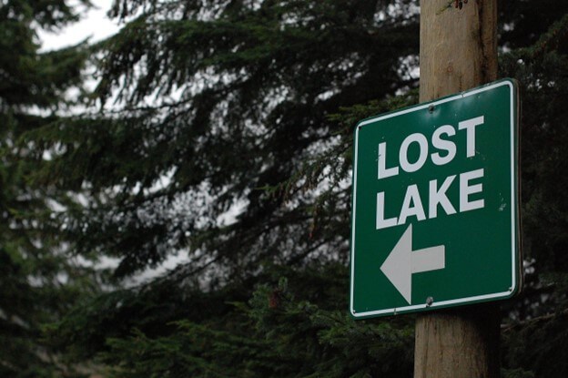 Person reflecting on life transitions during online therapy session