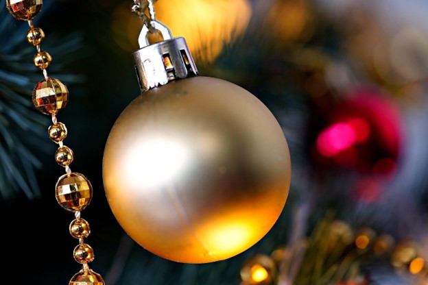 High-achieving professional practicing mindfulness to manage holiday stress using CBT strategies.